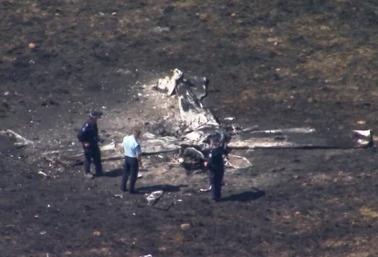 Pilot dies after plane plunges into Queensland field as farmer desperately tried to put out flames from fireball crash