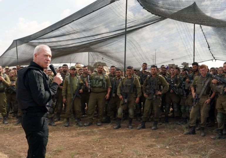 Israel’s defence chief tells troops they’ll see Gaza ‘from the inside soon’ as thousands gather at border