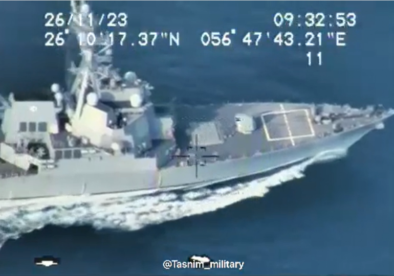 Iran releases chilling drone footage of US warships in its sights in flashpoint Strait of Hormuz as tensions rage