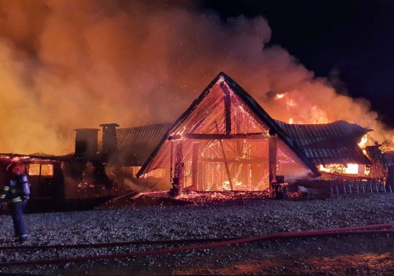 At least five people dead including a child as horror blaze breaks out at B&B in Romania while another three are missing