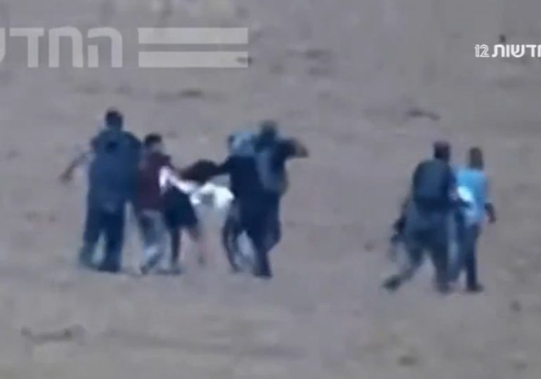 Chilling moment Hamas kidnappers drag Israeli woman into Gaza but she puts up such a brave fight it takes SEVEN of them