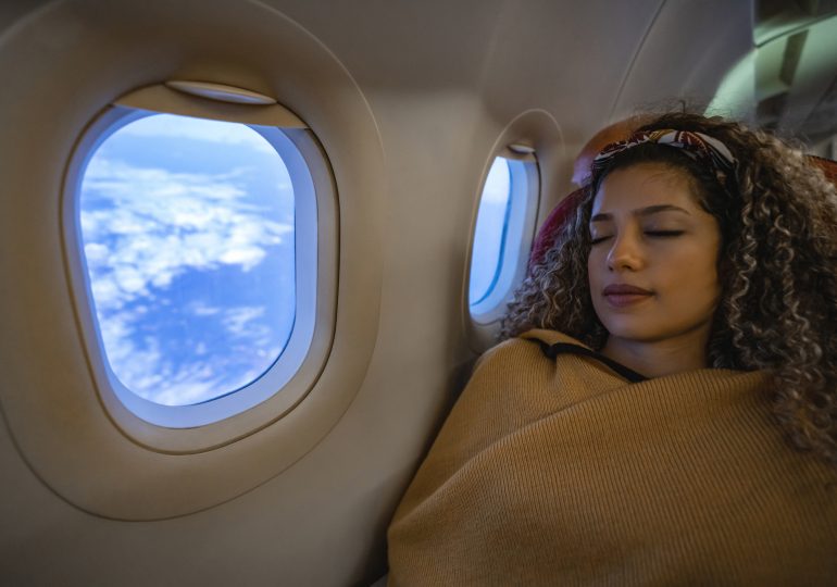 Here’s How You Can Sleep Better on Planes