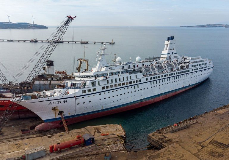 Inside abandoned cruise ship that was once the height of luxury now left to rot with eerie theatre, empty pool & gym