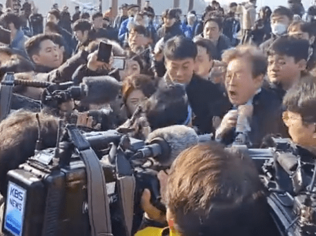 South Korea opposition leader stabbed in the neck by ‘fan who asked for autograph before lunging at politician’