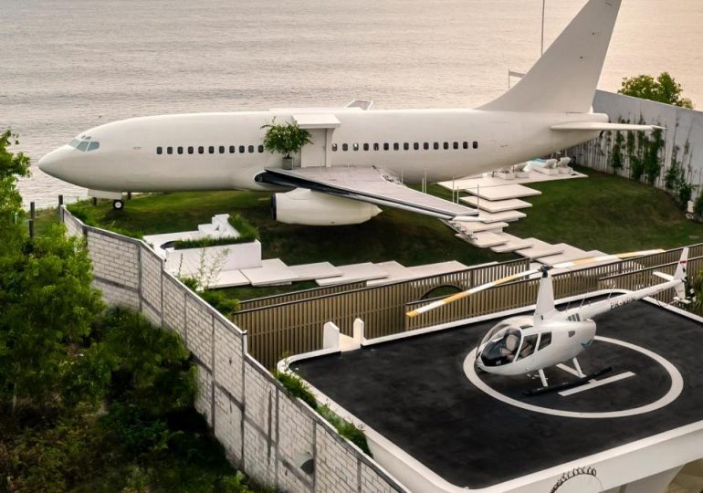 Inside bizarre AirBnB made from a Boeing 737 with cockpit jacuzzi, roof terrace on the wing and its own helipad