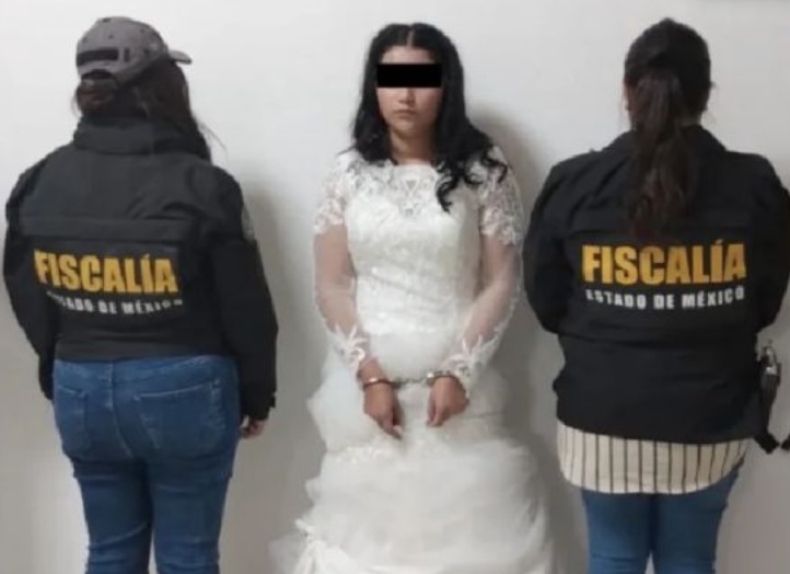 Moment bride is paraded in handcuffs after being arrested on her WEDDING DAY – but groom managed to escape