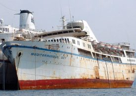 Incredible story behind ‘City on the Sea’ cruise ship so big it’s visible from SPACE which now lies beached & rotting