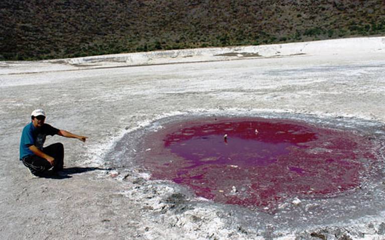 Volcanic crater believed to be ‘alien landing site guarded by Loch Ness-style beast’ turns blood red ‘when danger looms’