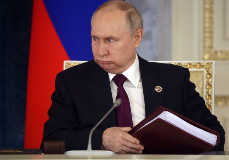 Mad-eyed Putin fuels ill-health rumours as he pulls bizarre gurning faces at meeting with nuke-armed lackey Lukashenko