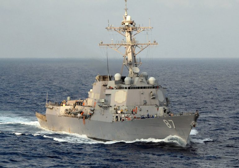 Houthi rebels fire cruise missile at US Navy destroyer in Red Sea in major attack after American and British airstrikes