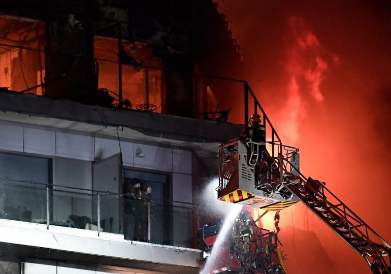 Dramatic moment hero Valencia firefighters use cherry-picker to rescue couple from 7th floor during cladding inferno