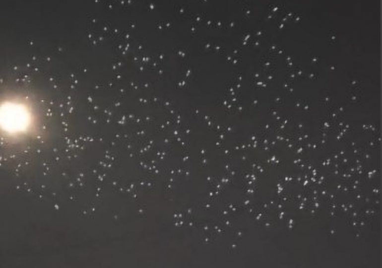 Mystery video shows glowing dots ‘flying’ in the night sky over Chinese city as locals fear ‘aliens attack the Earth’