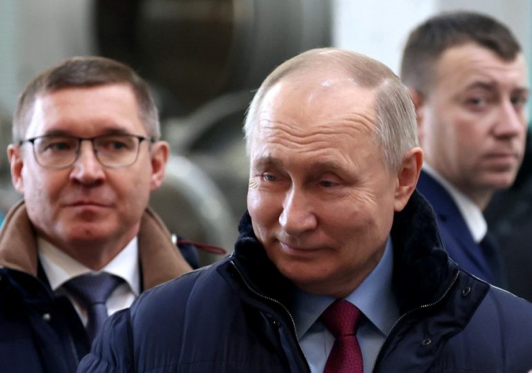 Ruthless Vladimir Putin SMIRKS as he’s seen for the first time since No1 enemy Alexei Navalny was ‘murdered’ in jail