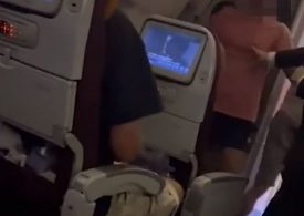 Shock moment shirtless Brit passenger PUNCHES air steward in the face after ‘smashing up plane toilet’ on horror flight