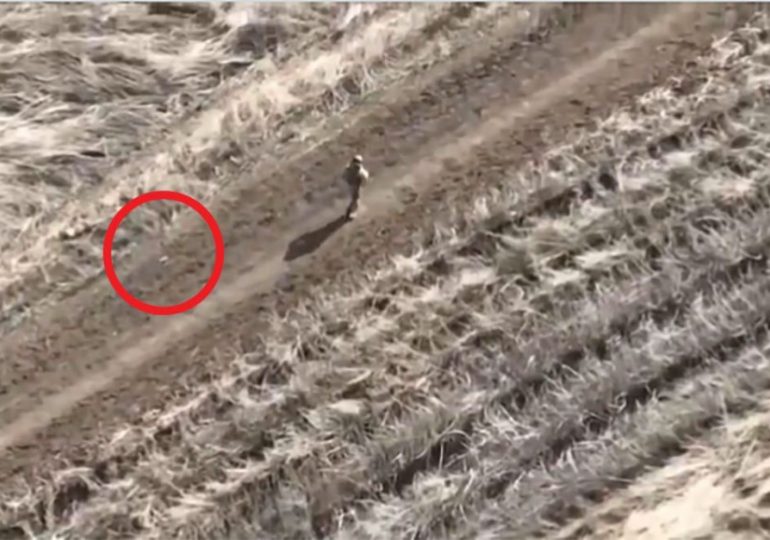 Moment Ukrainian kamikaze drone teases Putin soldier making futile attempt to flee on foot…before going in for the kill