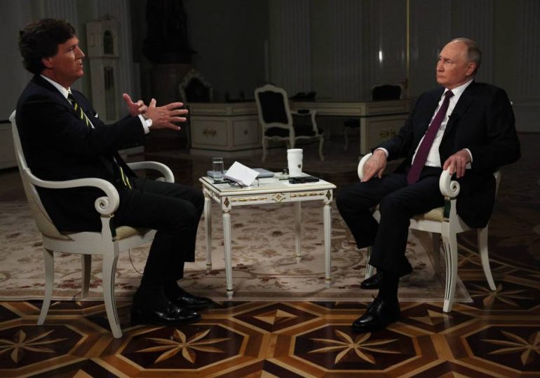 Sickly Putin ‘not comfortable’ in own skin as he sags, twitches & looks ‘emaciated’ in Tucker Carlson chat, says prof