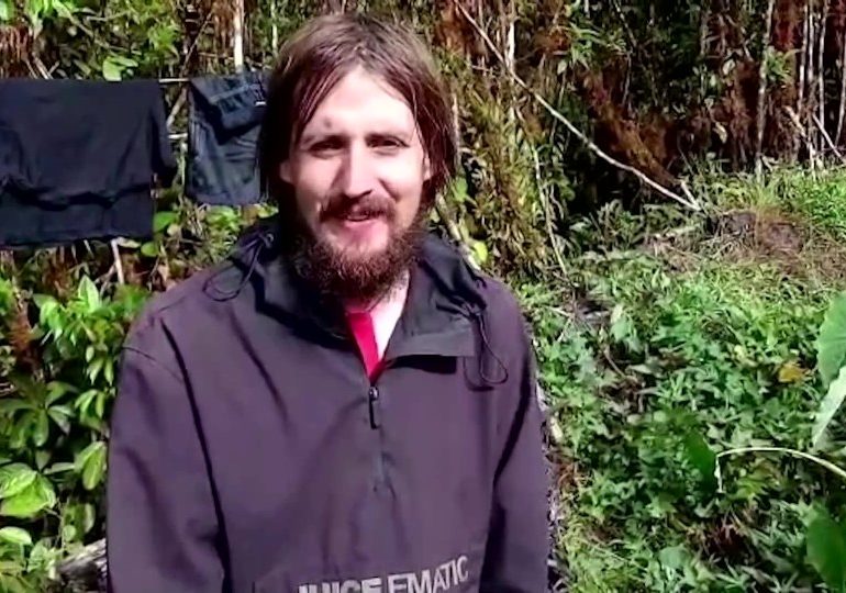 ‘I love you’, scruffy hostage pilot tells family in video after a YEAR held captive by bow & gun-wielding jungle rebels