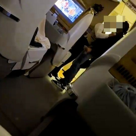 Shock moment ‘drunk’ passenger HEADBUTTS air steward in posh business class Emirates flight before crew tie him to seat