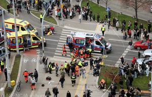 Car ploughs into crowd of people leaving at least 17 injured including three children before driver flees in Poland