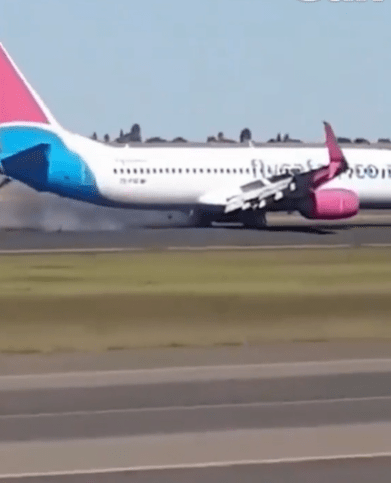 Watch moment WHEEL falls off fully loaded Boeing 737 as smoke billows from jet as it grinds along runway