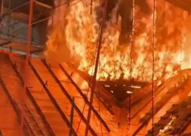 Watch terrifying moment builders caught up in Copenhagen fire flee realising spire is about to collapse