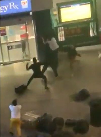 Watch shock moment passersby turn tables on thug who punched woman in NYC street as angry mob pummels him