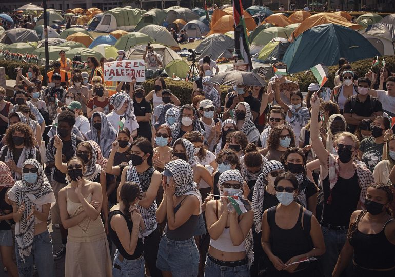 Columbia Protesters Defy University Orders to Clear Encampment Despite Suspensions