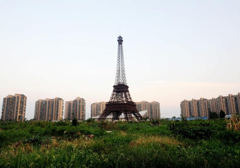 Inside China’s eerie ‘ghost town’ replica of PARIS complete with 300ft fake Effiel Tower & clone of Champs Elysées