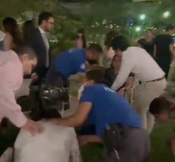 Watch moment at least 100 wedding guests are struck down by mystery illness that left them vomiting after 4-course meal