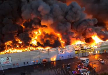 Horror moment huge inferno tears through shopping mall in Warsaw & destroys complex as firefighters tackle mystery blaze