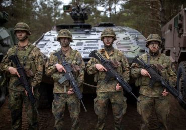 Conscription for ALL 18-year-olds ‘being considered’ in Germany amid call for UK to prep for all-out Nato war with Putin