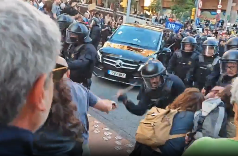Riot cops clash with anti-tourist protesters chanting ‘Barcelona is not for sale’ as holiday fury sweeps Spain