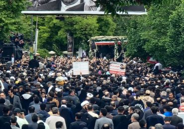 Funeral procession for Iranian president Raisi begins as thousands of mourners pack streets after deadly chopper crash