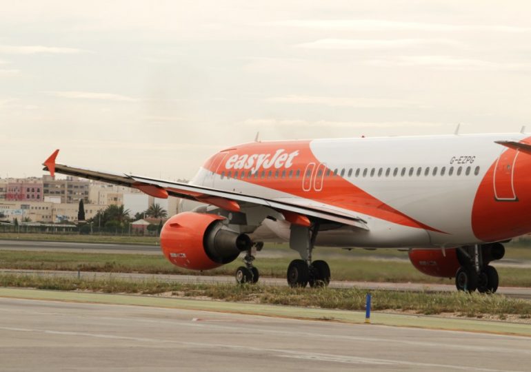 ‘Drunk’ Brit, 28, arrested in Spain after brawling on board easyJet flight and trying to open plane door mid-air