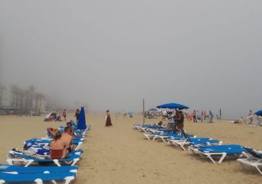 Watch moment Benidorm is shrouded in thick FOG forcing baffled Brit tourists to flee beach – as 23C sun shines back home