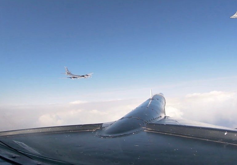 Dramatic moment US fighters come face to face with Russian jets as aircraft scrambled to intercept Vlad’s nuke bombers