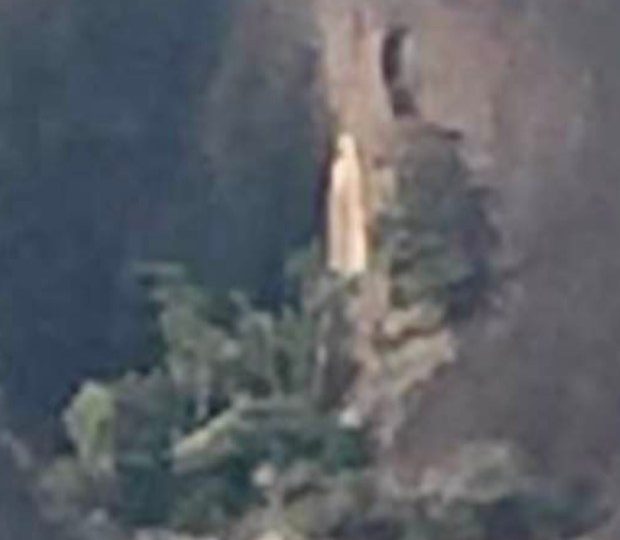 Incredible moment ‘Virgin Mary appears’ on side of sacred mountain as believers hail appearance of ‘holy sign’