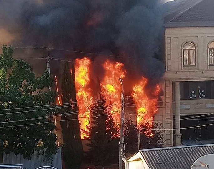 ‘Six police officers killed & 12 injured’ in series of attacks at synagogue & church in Russia as two gunmen ‘shot dead’