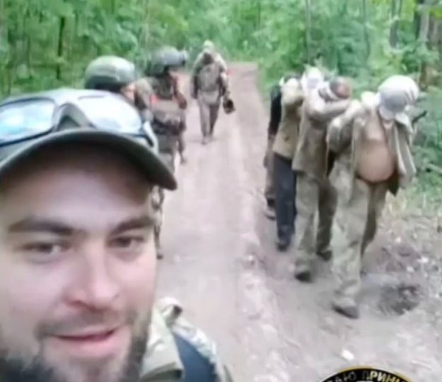 Putin’s troops film blindfolded Ukrainian PoWs on harrowing death march before mock execution in sick footage sent to UN