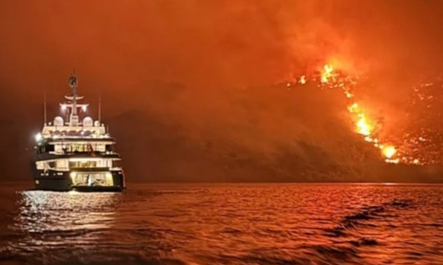 Superyacht crew charged after fireworks shot from 176ft luxury vessel spark wildfires on Greek holiday island