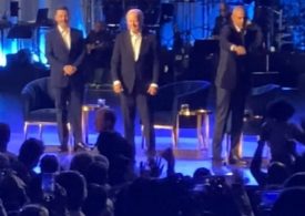 US President Joe Biden, 81, appears to FREEZE again – before Barack Obama comes to his rescue to usher him off stage