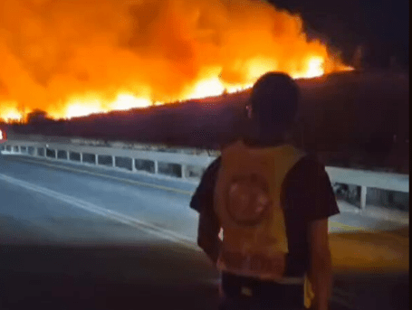 Massive fires ‘sparked by Hezbollah rocket and drone strikes’ rage across Israel as city evacuated