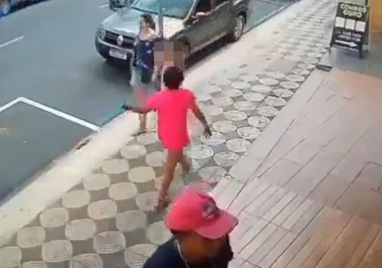 Shocking moment woman SLAPS stranger’s daughter on Brazil street before passerby steps in to deliver instant karma