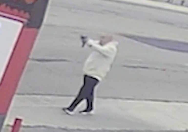 Horror moment gunman blasts passing cars at random as he coolly walks down LA street in broad daylight killing dad-of-4