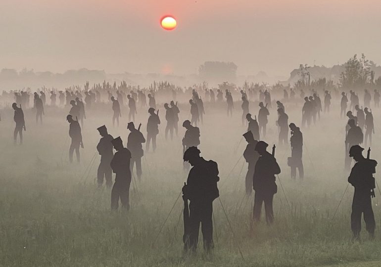 Haunting art honours the 1,475 brave Allied troops who died on D-Day standing like ghosts above beaches where they fell