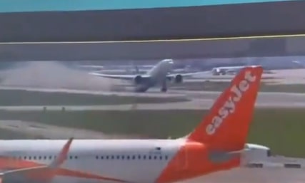 Watch terrifying moment packed Boeing jet scrapes tail along Milan runway in cloud of smoke & debris in failed take-off