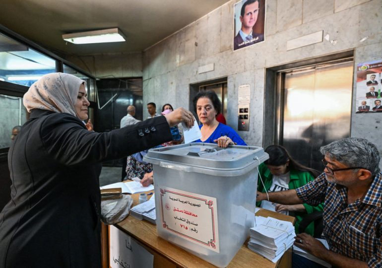 Syrians Vote for Next Parliament, Which May Pave the Way to Extending Assad’s Rule