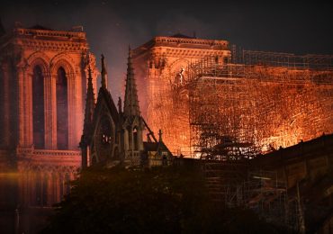 What caused the Notre Dame fire in Paris, was anyone hurt and how much has been raised for the cathedral to be restored?