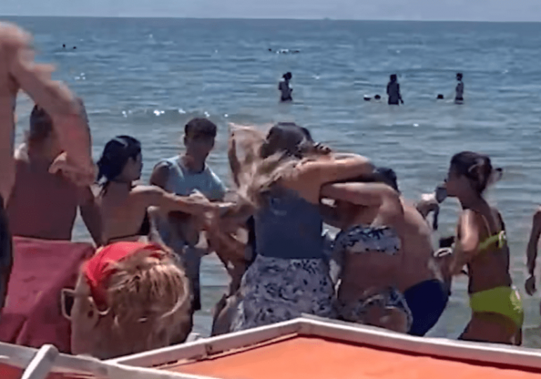 Horror moment sunbed wars turn violent as women wrestle & grab each other’s hair in front of shocked tourists