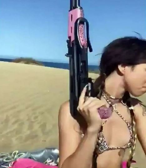 Shocking moment woman pulls out ‘AK-47’ to scare off man ‘touching himself’ on beach in Gran Canaria